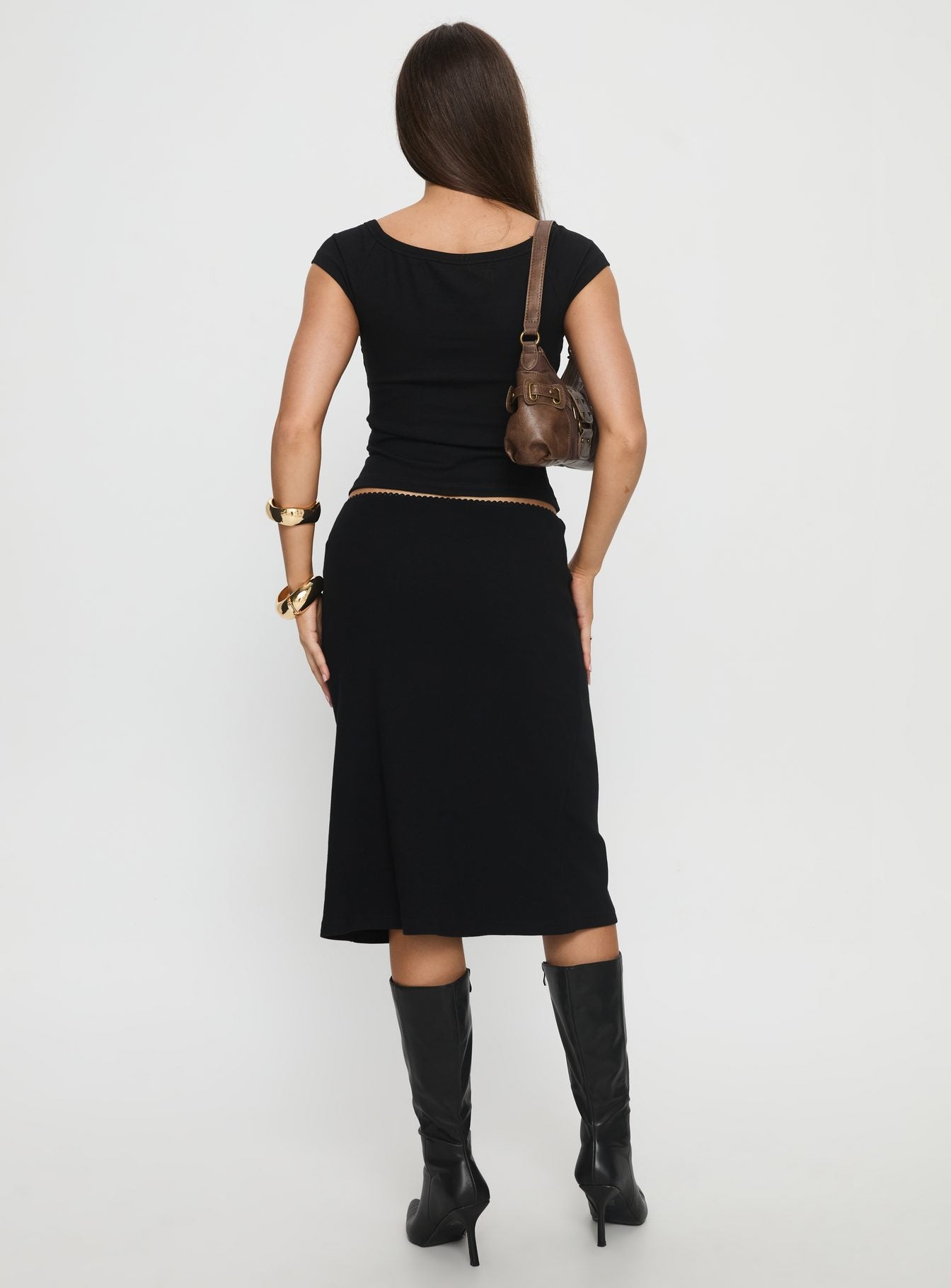 back view of model wearing Princess Polly Baseline Rib Midi Skirt Black Midi Skirts 