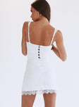 Lace mini dress, Underwire bust, adjustable straps, six button fastening at back Good stretch, fully lined