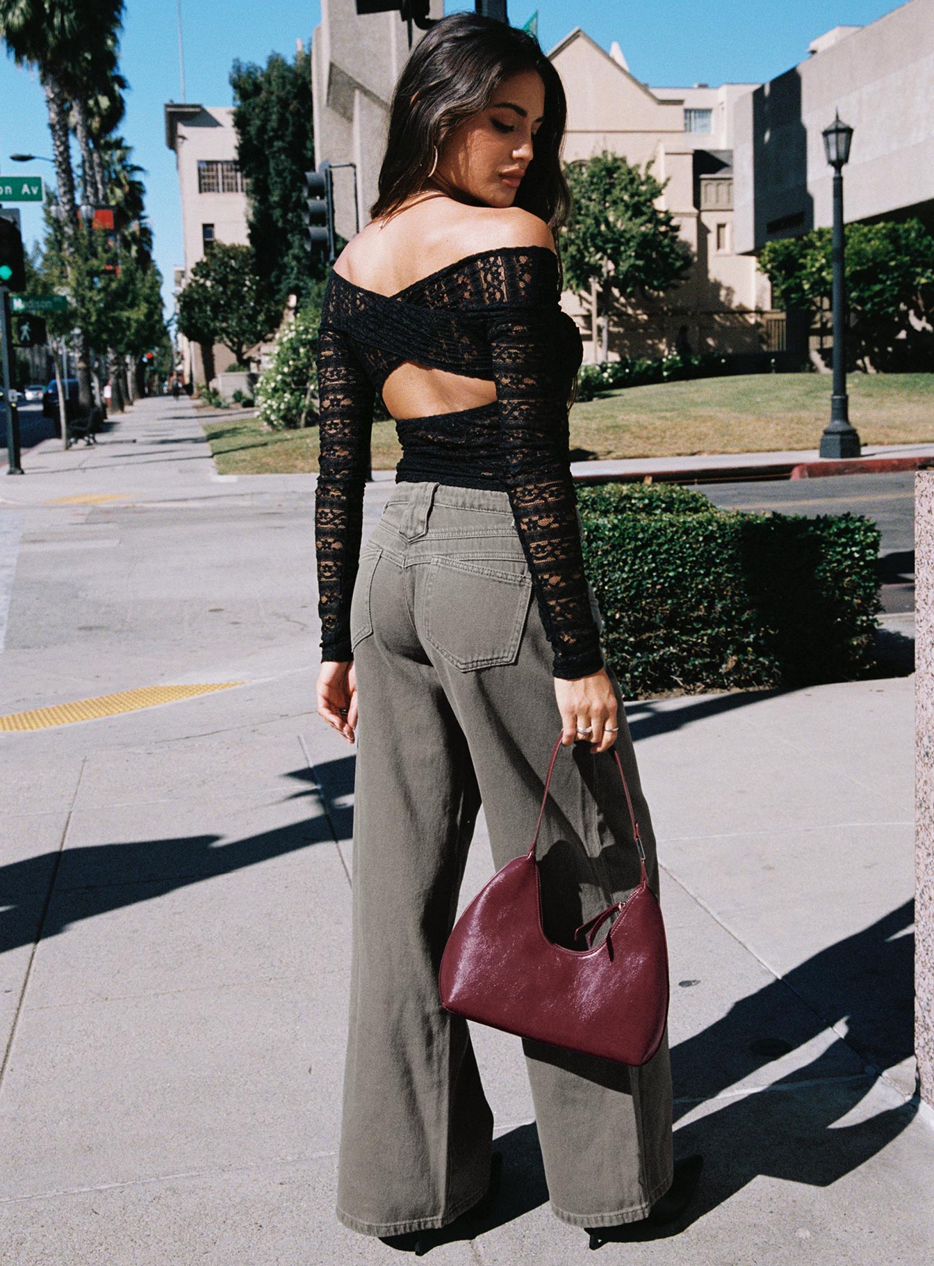 back view of model wearing Princess Polly West Side Jeans Grey Wash Mid Rise 