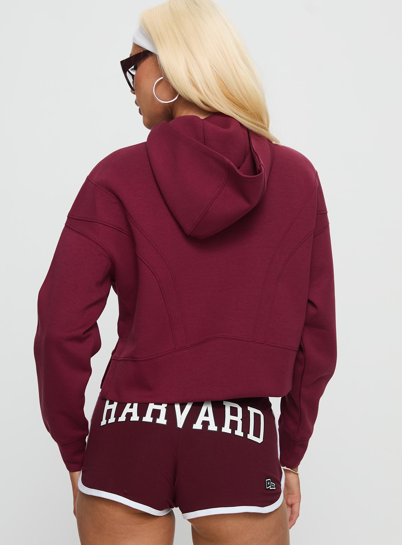 back view of model wearing Princess Polly Harvard Buttersport Half-zip Hoodie Crimson cropped 