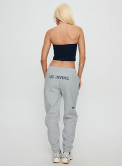 back view of model wearing Princess Polly UC Irvine Basic Sweatpants Grey Mid Rise Pants 