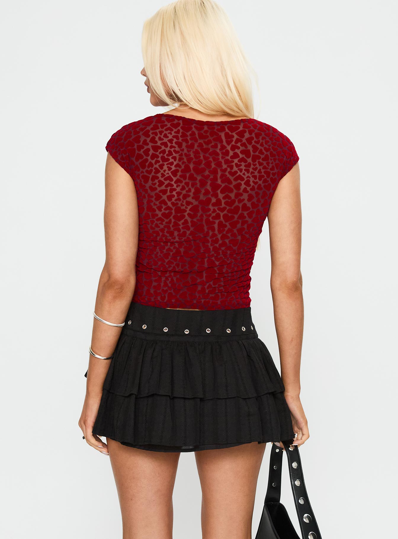 back view of model wearing Princess Polly Fire Sign Studded Tiered Mini Skirt Black Mini Skirts 