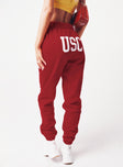 back view of model wearing Princess Polly USC Sweatpants Cardinal Red / White 