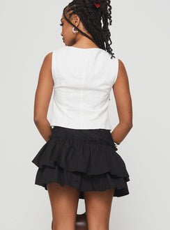 back view of model wearing Princess Polly Selenis Asymmetrical Mini Skort Black High Waisted Shorts 