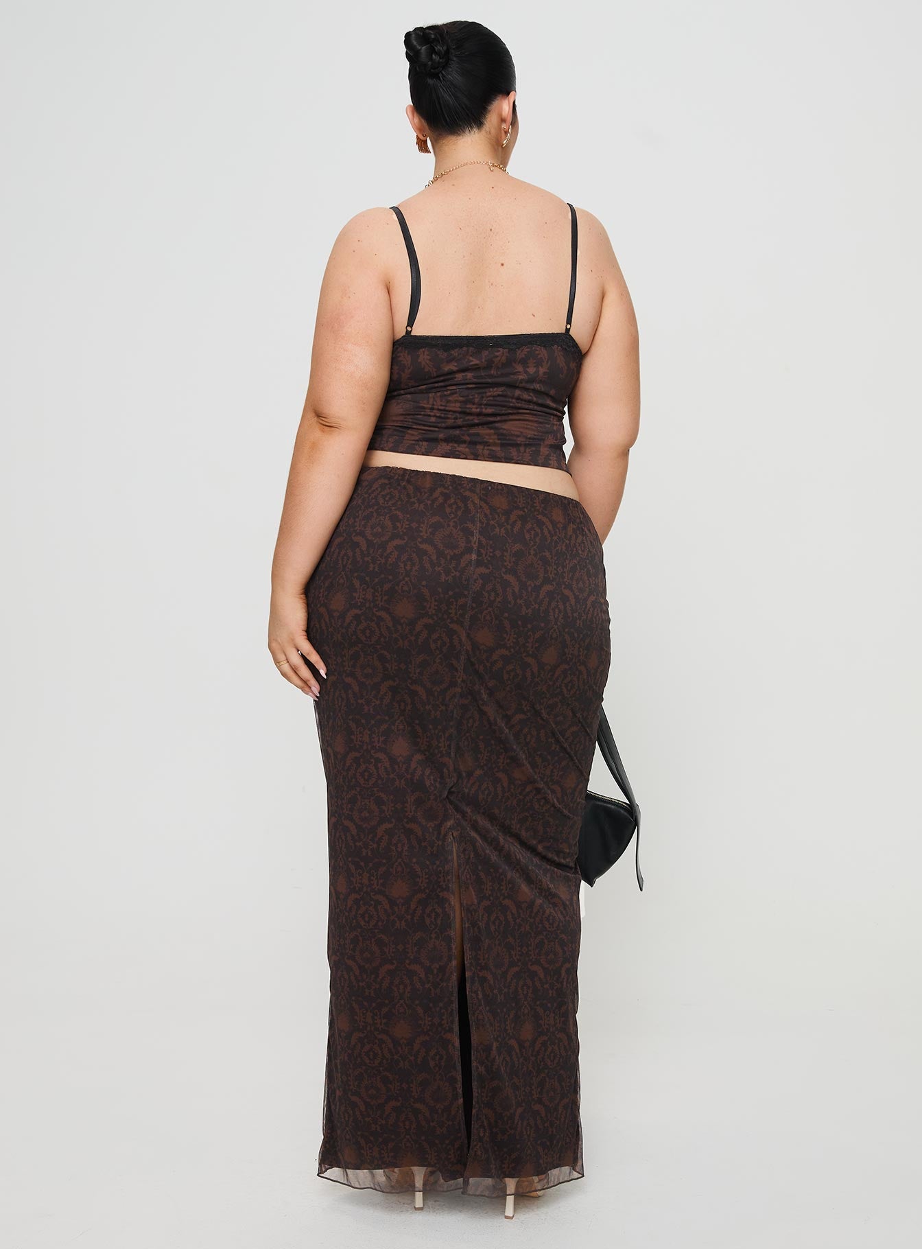 back view of model wearing Princess Polly Hostona Maxi Skirt Mutli Curve Maxi 