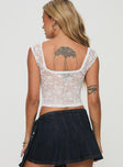 Lace top Fixed shoulder straps, scooped neckline, ruched bust Good stretch, lined bust