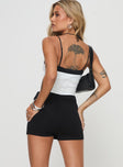 back view of model wearing Princess Polly Karley Skort Black High Waisted Shorts 