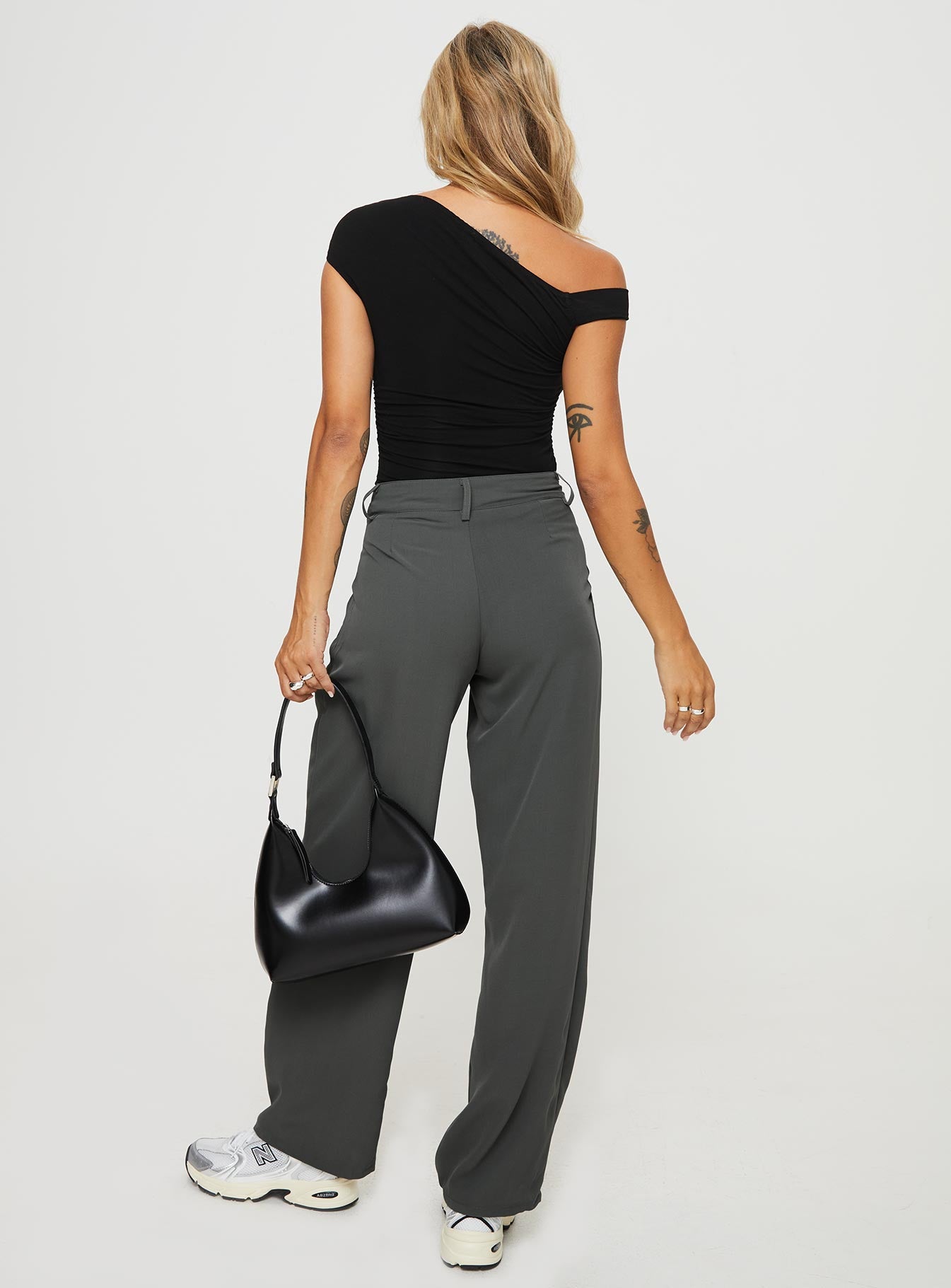 back view of model wearing Princess Polly Nikkey Low Rise Pants Slate Mid Rise 