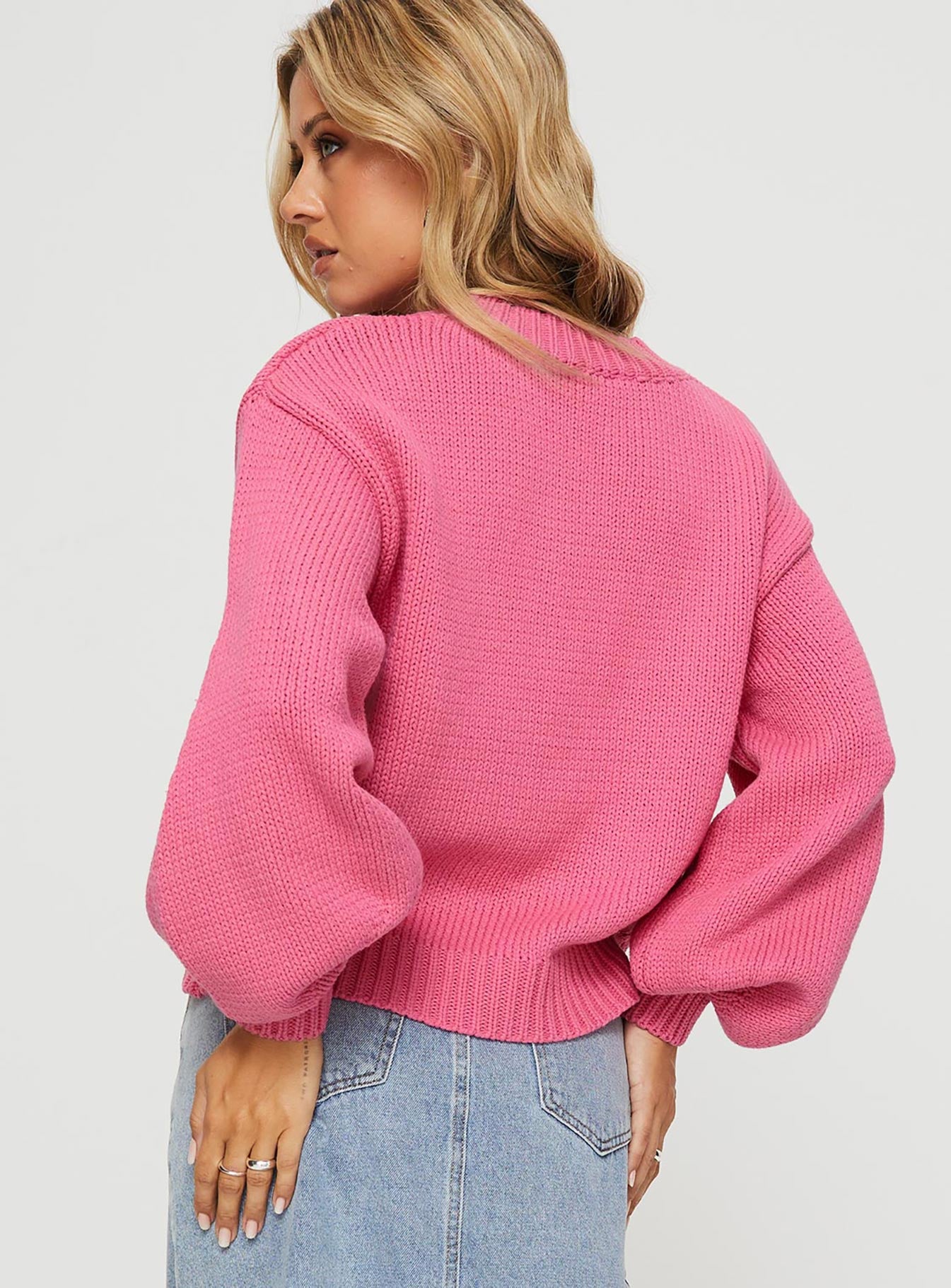 back view of model wearing Princess Polly Harmony Knit Sweater Pop Pink regular 
