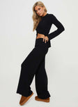 Matching rib-knit set Long sleeve top, classic collar, button fastening at front High-rise pants, thick elasticated waistband, wide leg