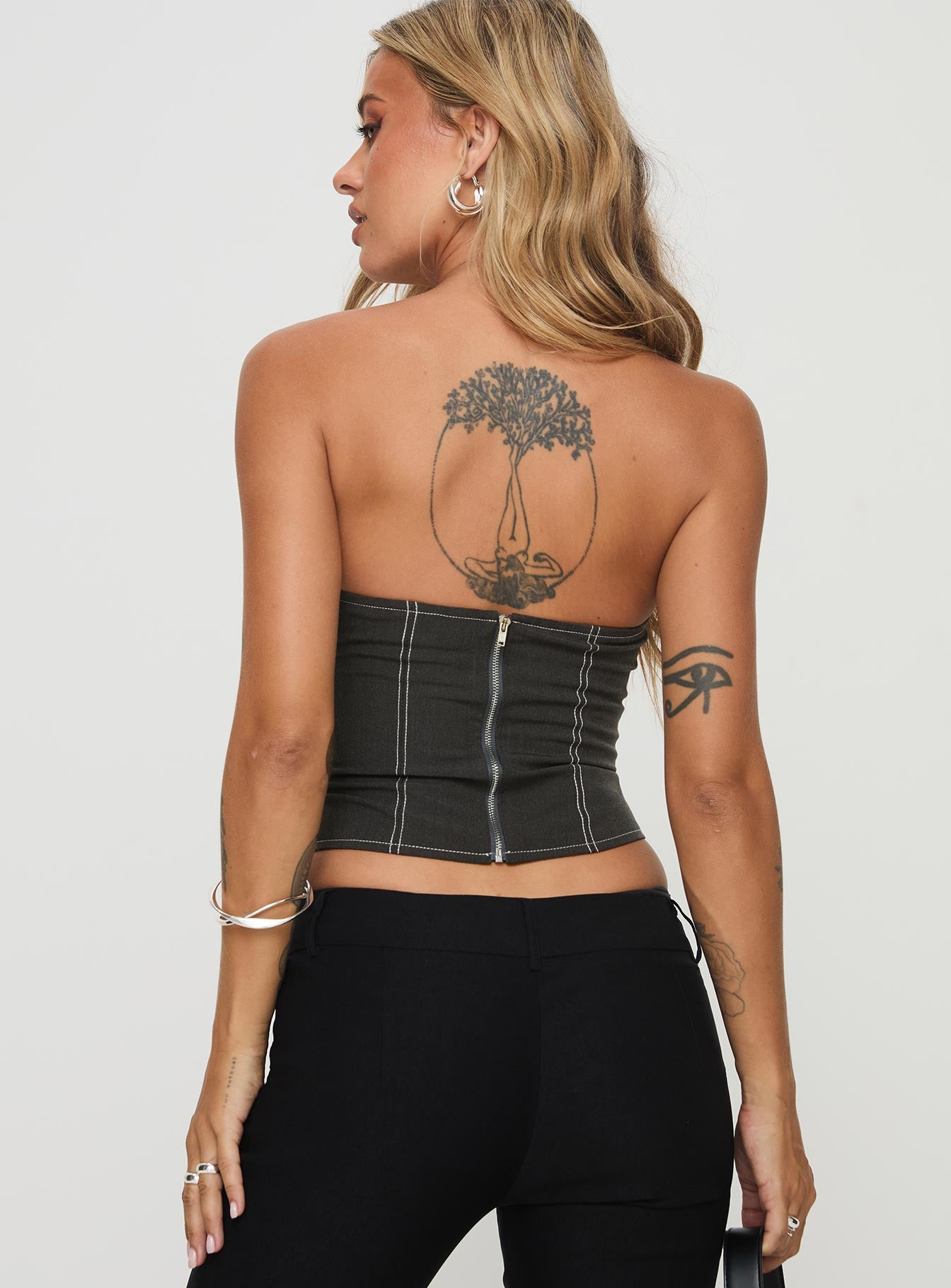 back view of model wearing Princess Polly Vacke Strapless Top Grey Sleeveless Sweetheart 