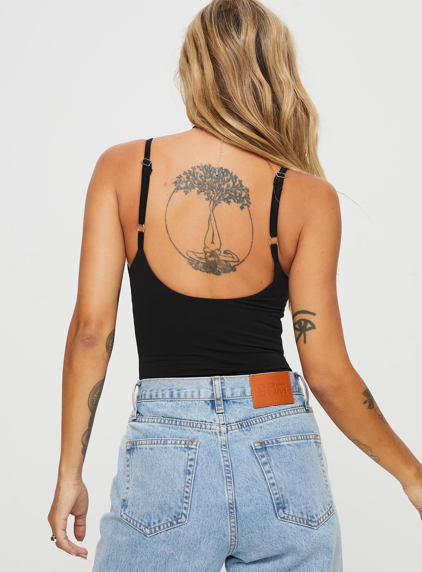 back view of model wearing Princess Polly Off Stage Bodysuit Black Sleeveless 