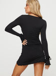 back view of model wearing Princess Polly Dalzine Long Sleeve Mini Dress Black Petite Sweetheart Neckline 