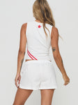 back view of model wearing Princess Polly Sunkiss Shorts White Low Rise Shorts 