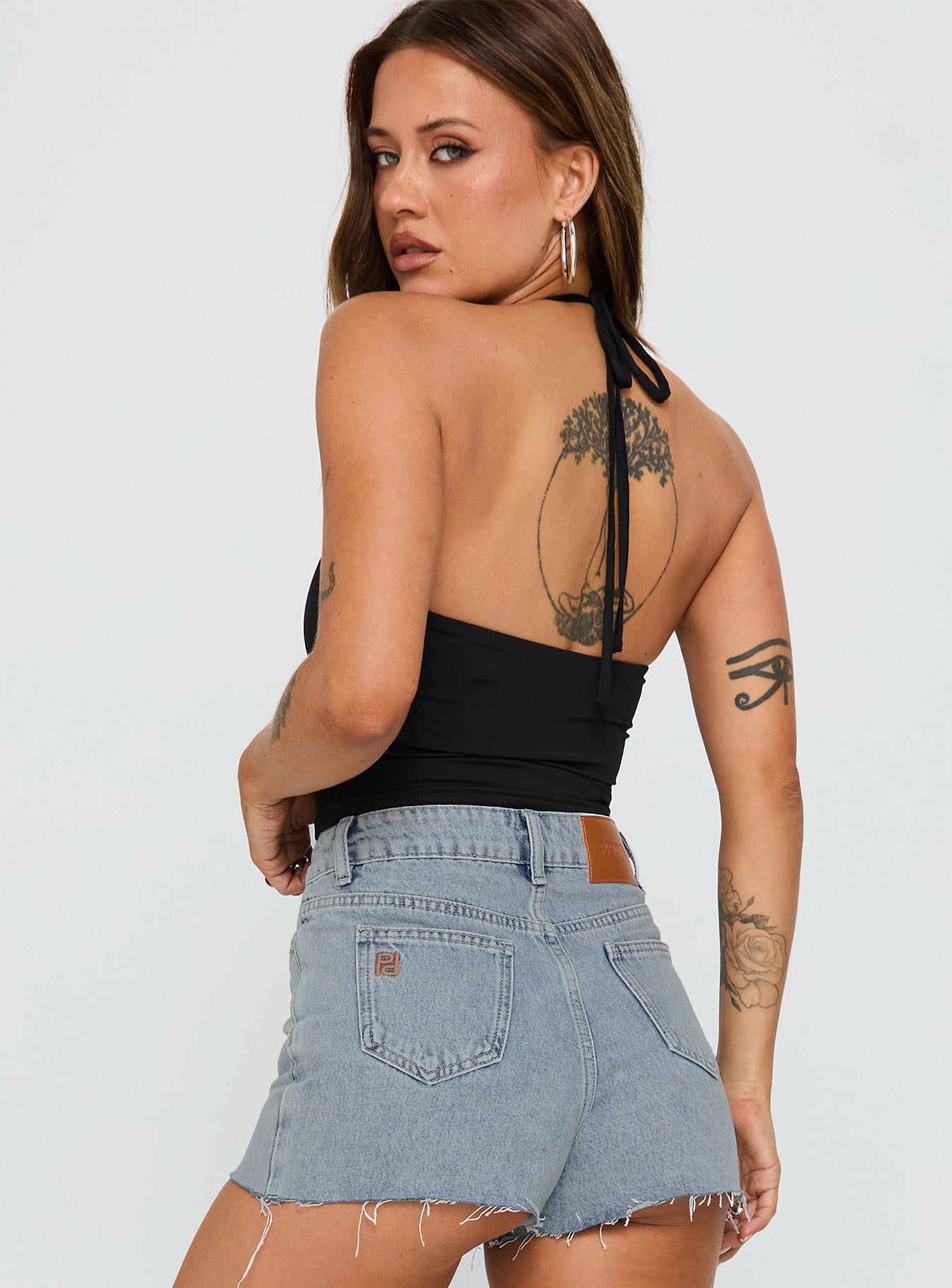 back view of model wearing Princess Polly Ezekiel Nylon Top Black Sleeveless Scoop Neck 