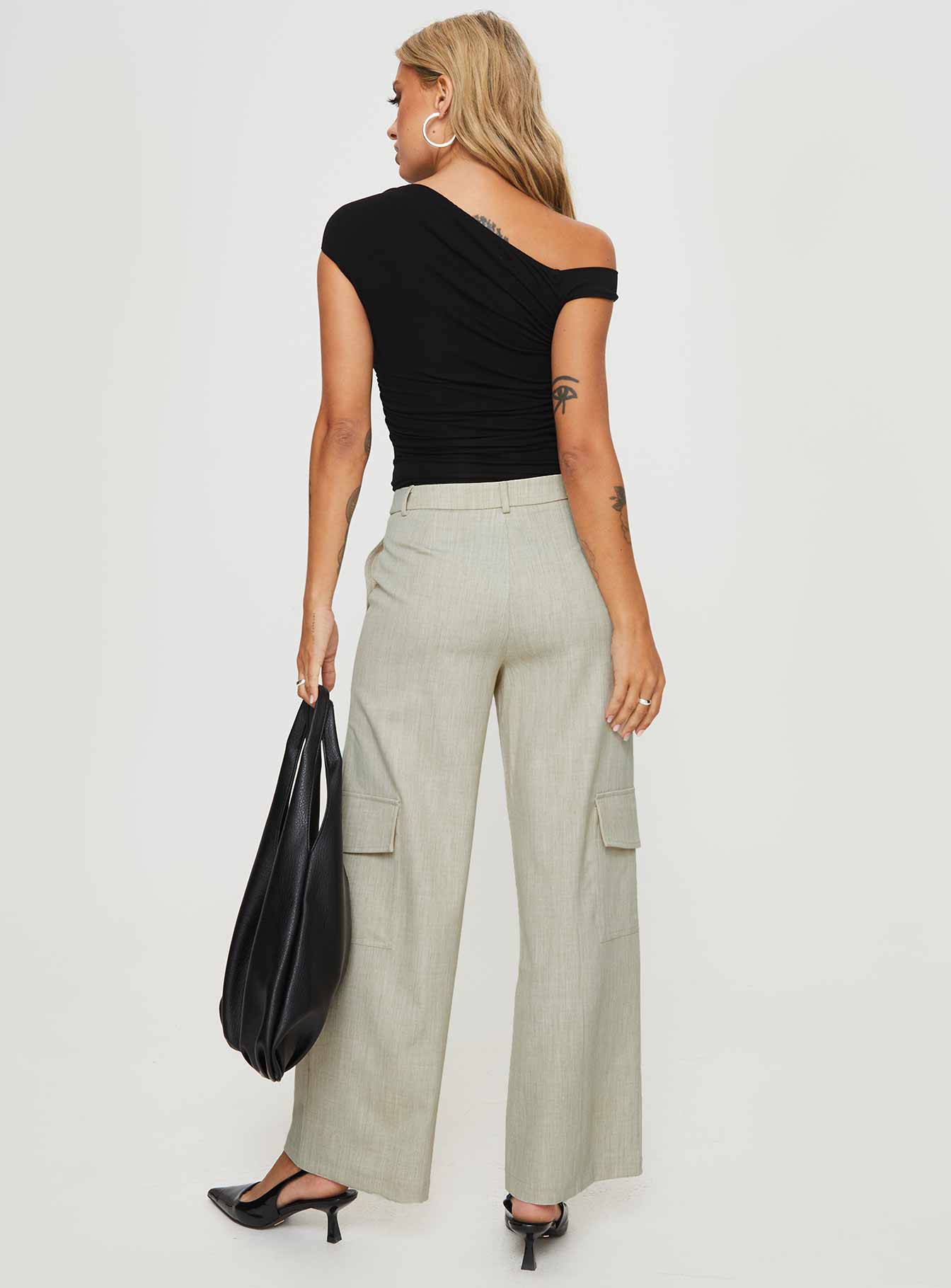 back view of model wearing Princess Polly Stacks Cargo Pant Beige Mid Rise 