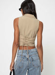 Cropped vest top Lapel collar, v-neckline, button fastening at front, tie fastening at back, double pointed hem