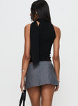 back view of model wearing Princess Polly Can't Sleep Skort Charcoal Stripe Low Rise Shorts 