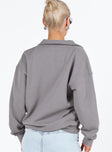 Sweatshirt High neckline Quarter zip  Drop shoulder Elasticated waistband and cuff