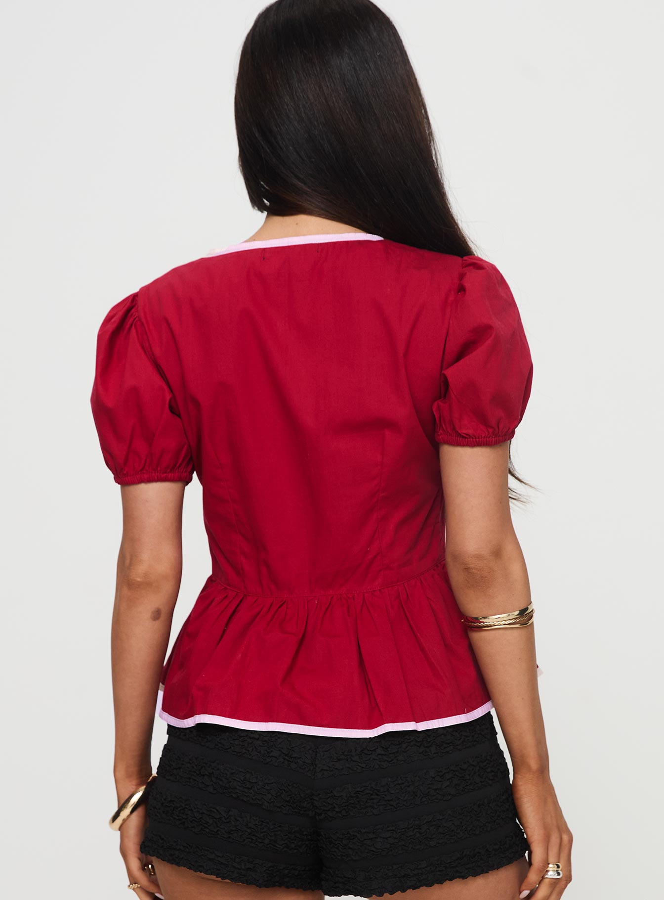 back view of model wearing Princess Polly Ryota Blouse Red/pink Short Sleeves Crew Neck 