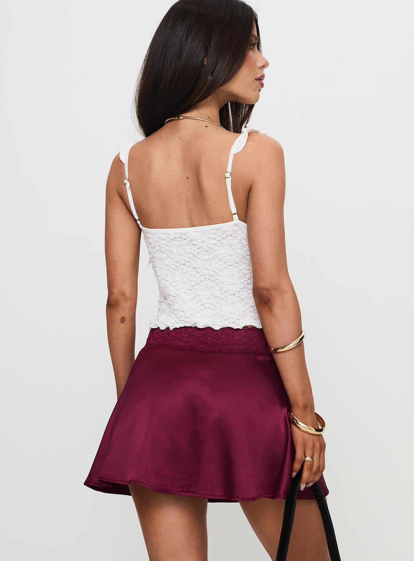 back view of model wearing Princess Polly For Me Mini Skirt Burgundy Mini Skirts 