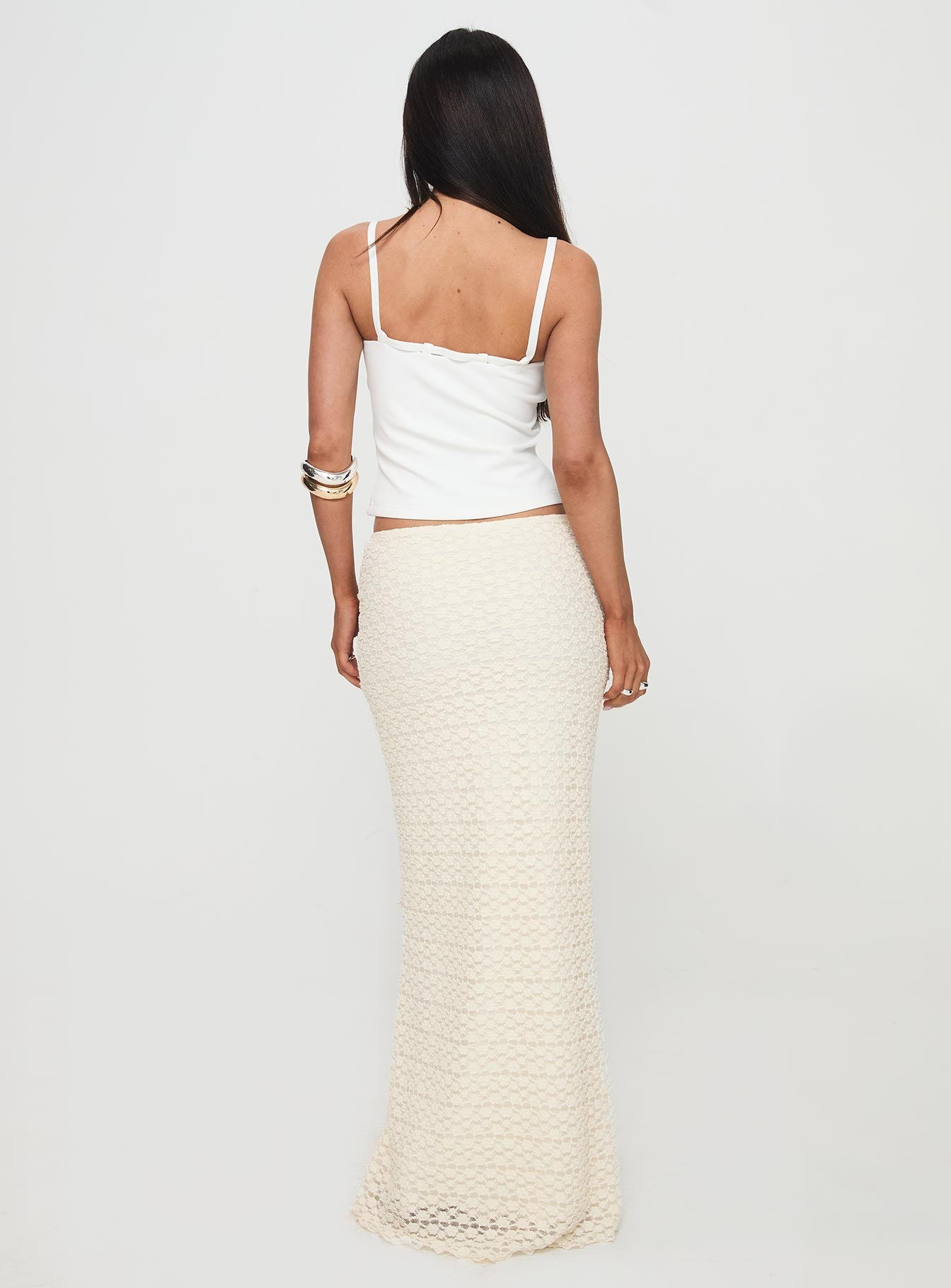 back view of model wearing Princess Polly Incandescent Maxi Skirt Cream Maxi 