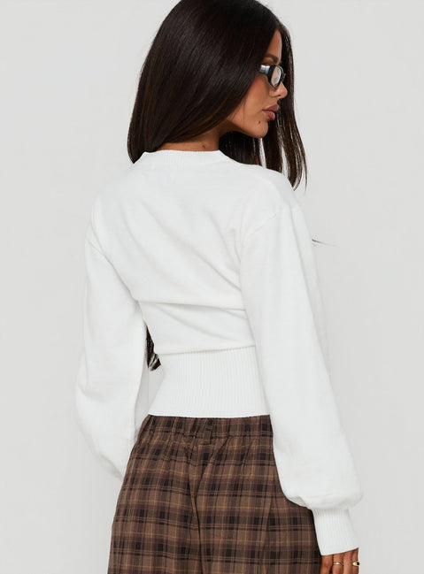 Showcasing the Emerica V Neck Cinched Sweater White womens-jumpers in oversized short length back view of model wearing Princess Polly