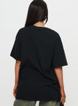 back view of model wearing Princess Polly Cocktail Hour Oversized Tee Black Half Sleeves Crew Neck 