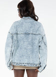 Oversized light wash denim jacket  Classic collar, drop shoulder, button fastening at front, oversized chest pocket, single button cuff