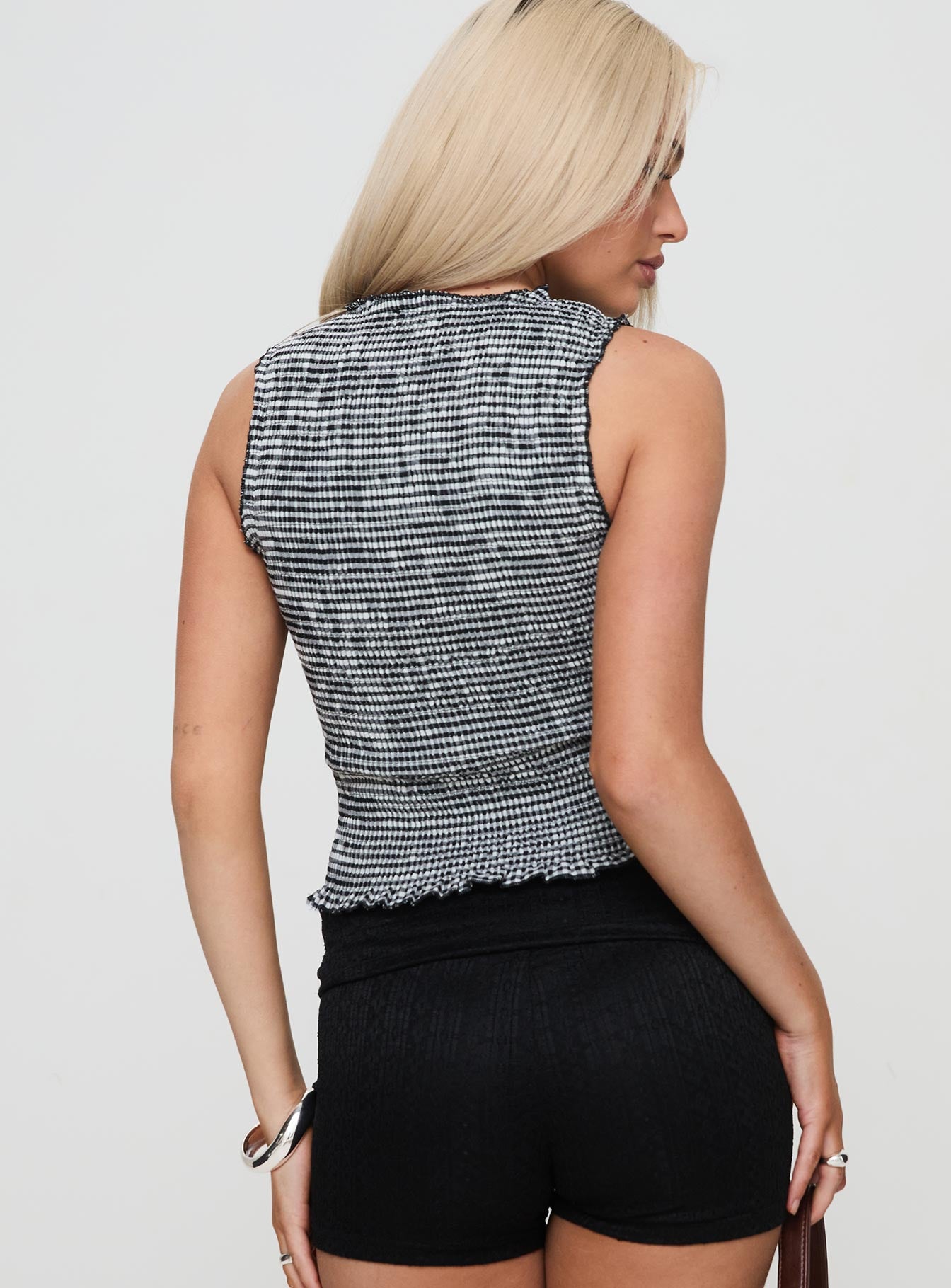 back view of model wearing Princess Polly Plastic Hearts Top Black Sleeveless Crew Neck 