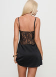 back view of model wearing Princess Polly Anavieve Lace Mini Dress Black V-Neck 