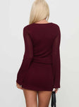 back view of model wearing Princess Polly Charming Long Sleeve Mini Dress Maroon V-Neck 