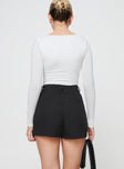 High rise shorts Belt looped waist, zip and clasp fastening, twin hip pockets, subtle pleats at waist Non-stretch, unlined 