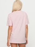 back view of model wearing Princess Polly Asta Oversized Tee Pink Half Sleeves Crew Neck 