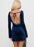 back view of model wearing Princess Polly Syrene Velvet Mini Dress Navy Boat Neck 