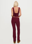 back view of model wearing Princess Polly Closed Eyes Flared Pants Maroon Low Rise Pants 