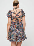 Floral mini dress Square neckline, padded bust, open back with tie fastening