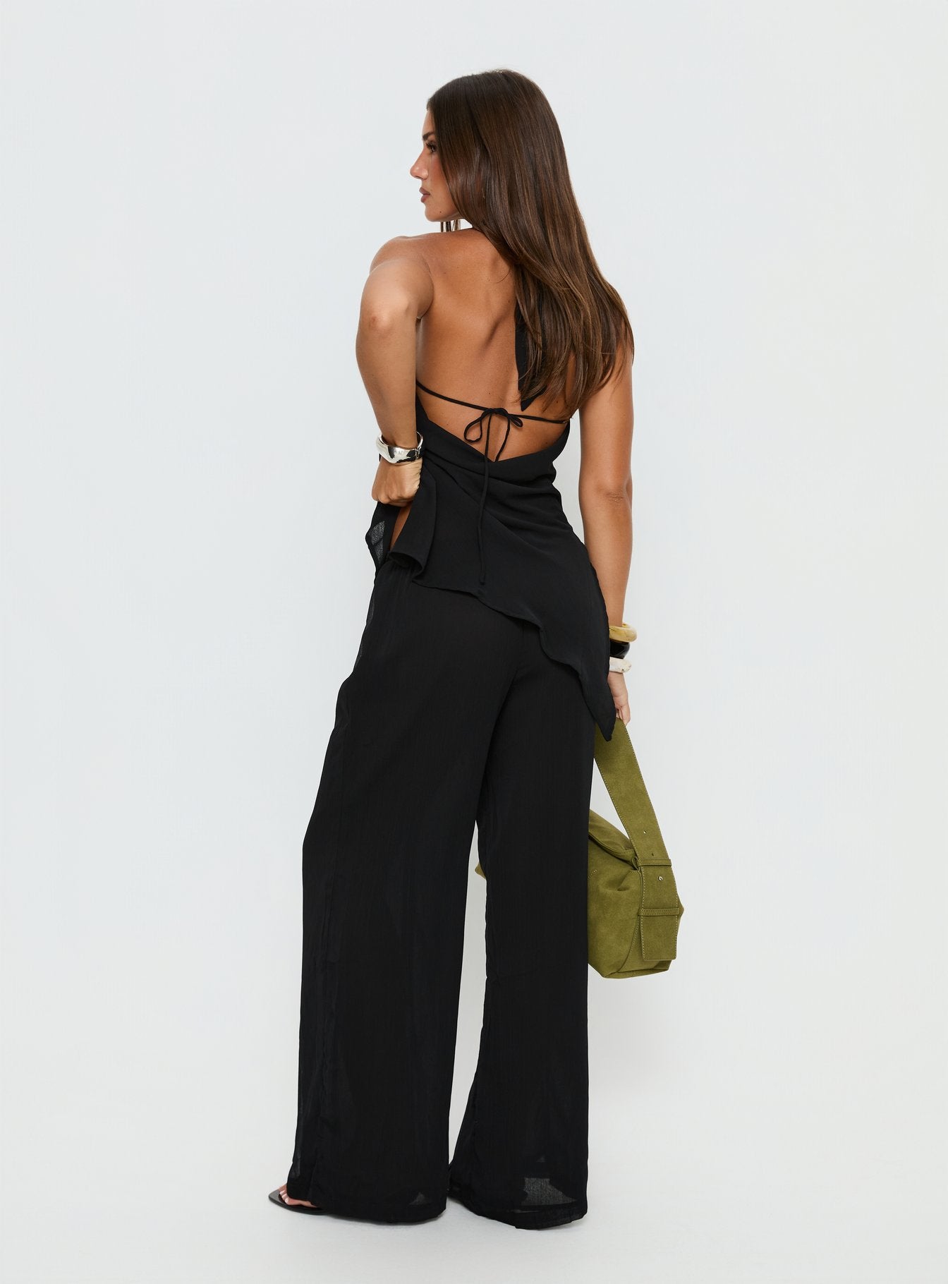 back view of model wearing Princess Polly Emorisa Mid Rise Chiffon Pant Black Mid Rise Pants 