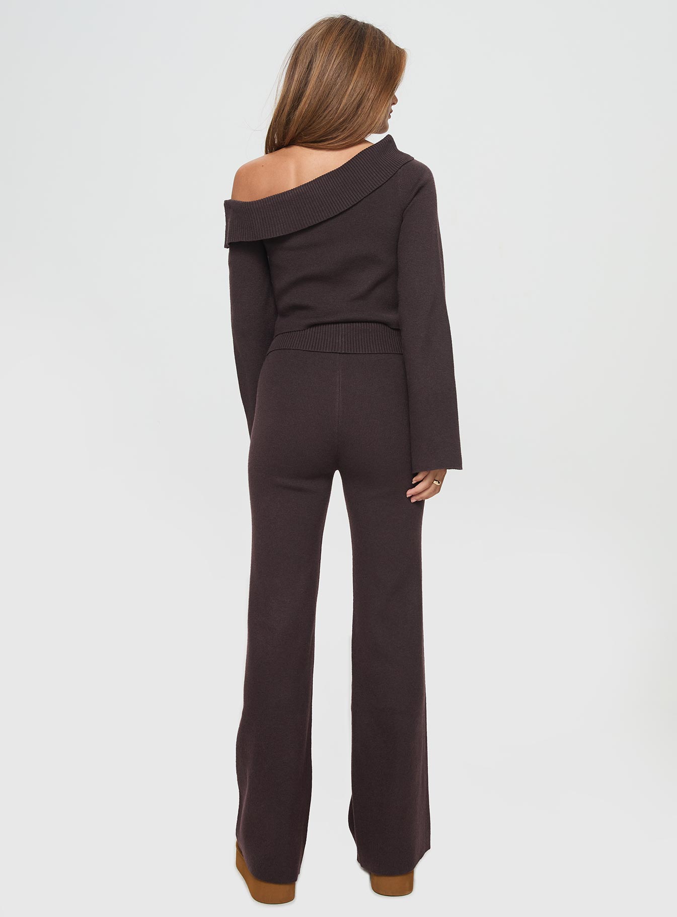 back view of model wearing Princess Polly Sina Off The Shoulder Top Chocolate Full Sleeves Asymmetric Neckline 