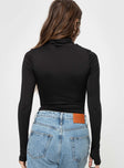 Bodysuit  Slim fitting, turtle neck, thumb hole on sleeve, brief cut bottom Press clip fastening at the base