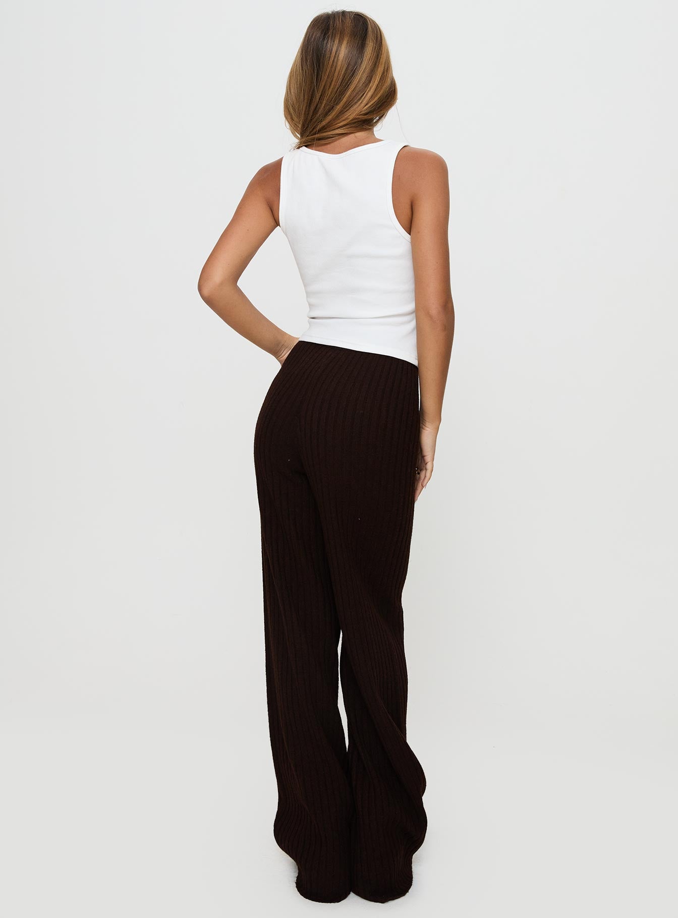 back view of model wearing Princess Polly Montana Knit Pants Chocolate Brown High Waisted Pants 