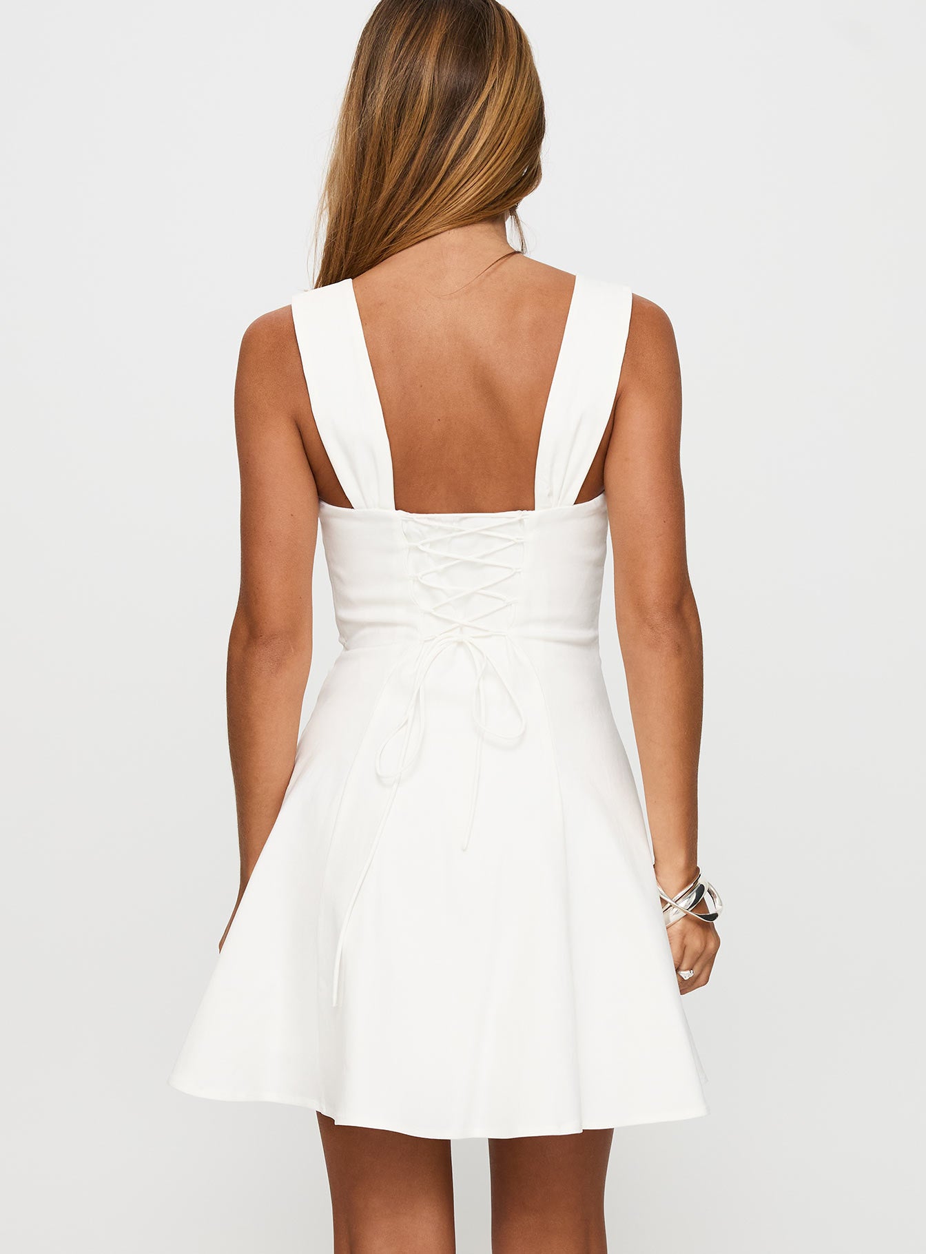 back view of model wearing Princess Polly Honey Suckle Tie Up Mini Dress White Square Neck 