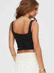 back view of model wearing Princess Polly Barlay Top Black Sleeveless Square Neck 