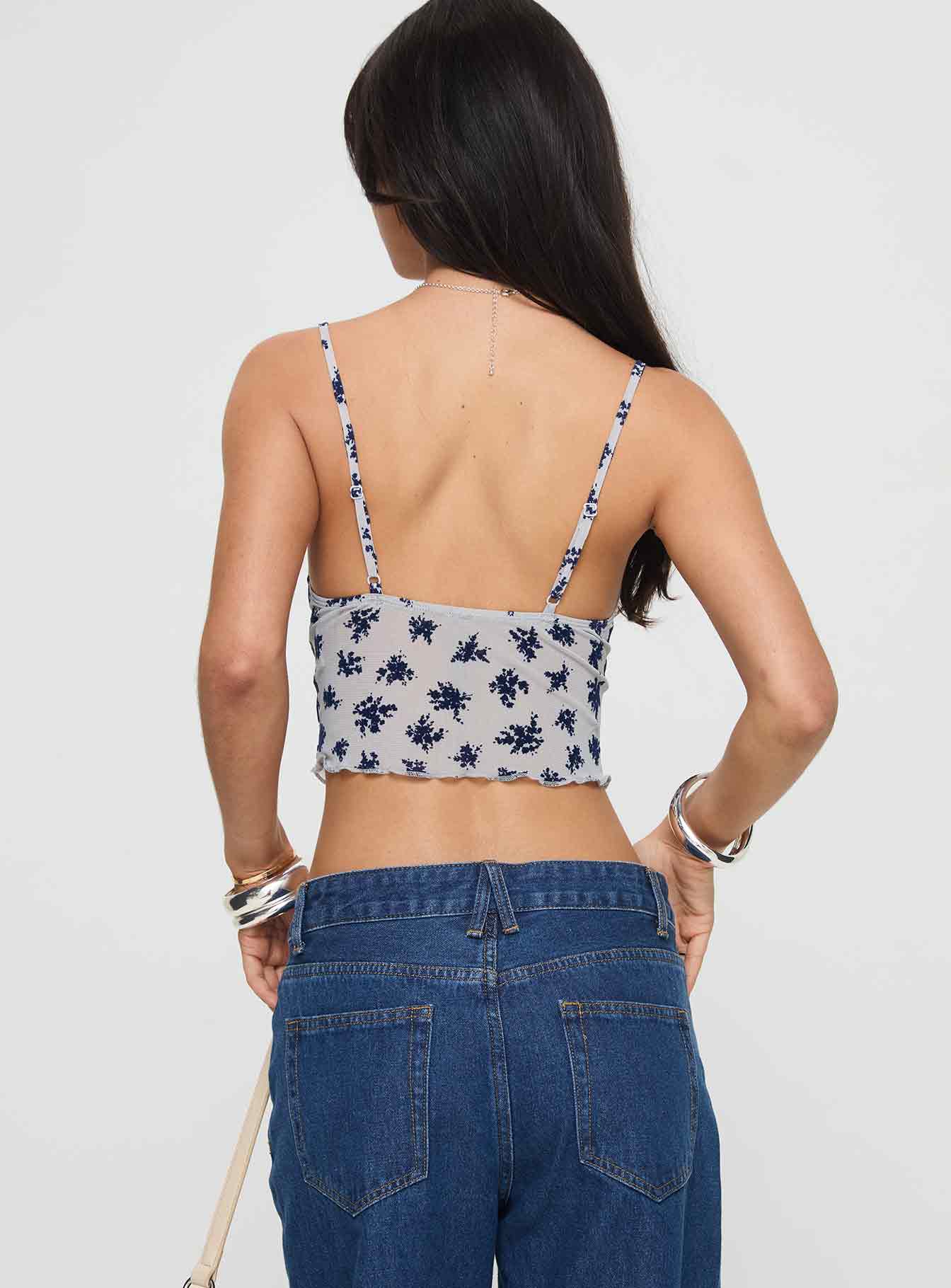 back view of model wearing Princess Polly Norde Top Floral Cluster Pale Grey Sleeveless V-Neck 