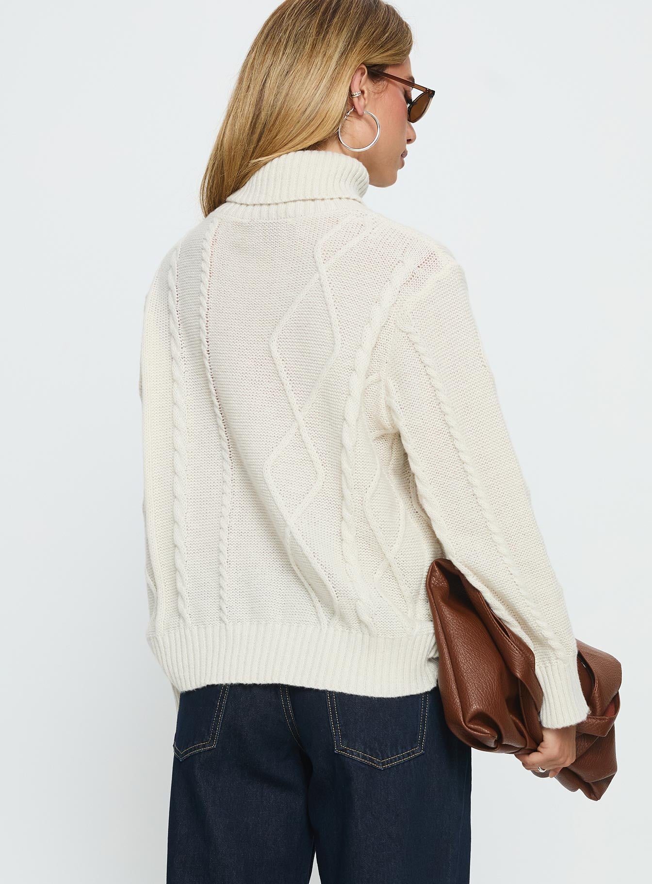 back view of model wearing Princess Polly Tarynne Cable Knit Turtle Neck Sweater Beige Long 