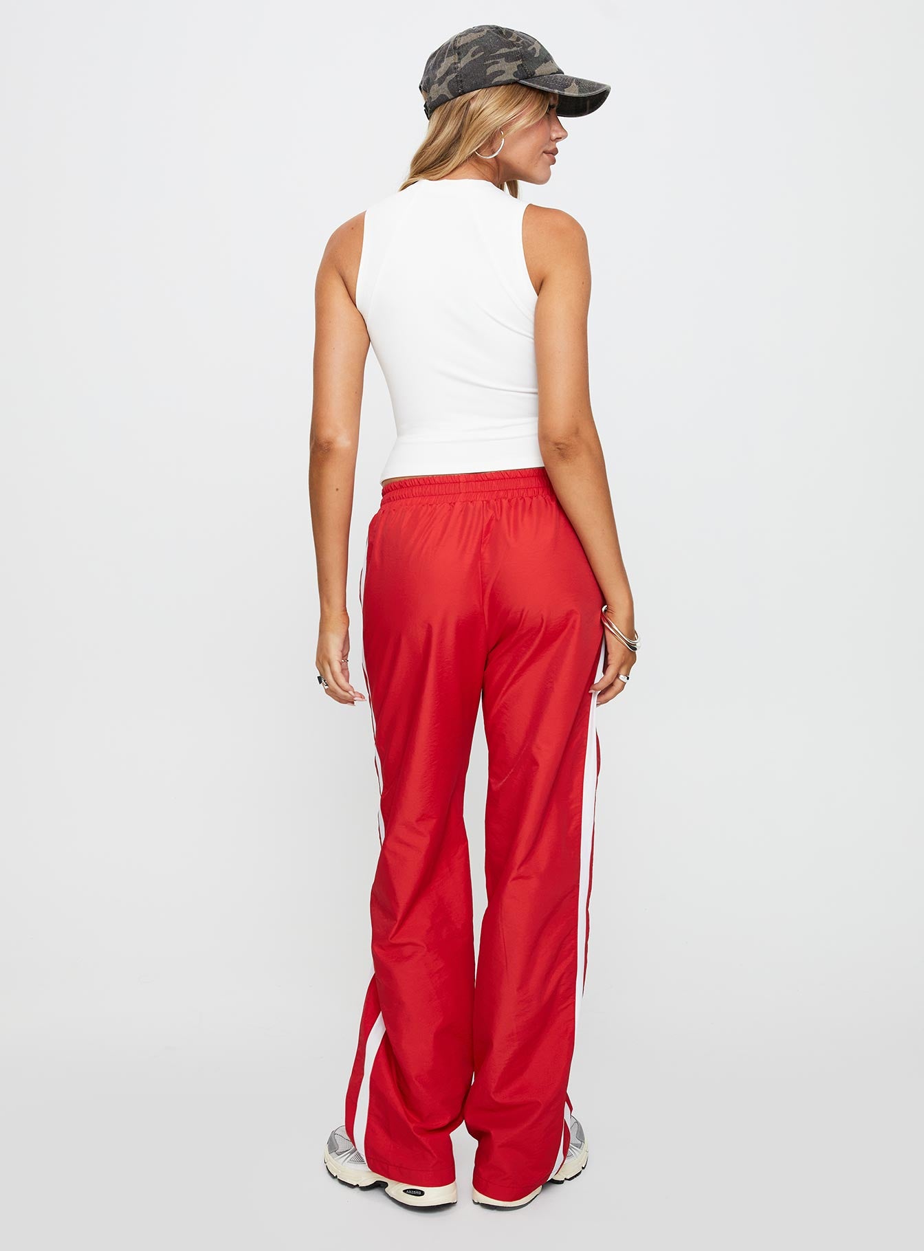 back view of model wearing Princess Polly Keli Track Pants Red / White High Waisted Pants 