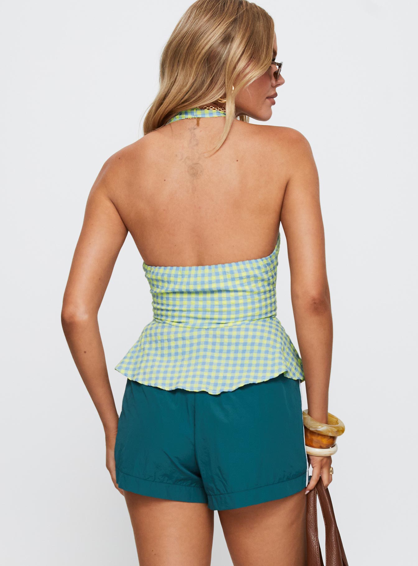 back view of model wearing Princess Polly Becci Halter Top Multi Sleeveless Plunger 