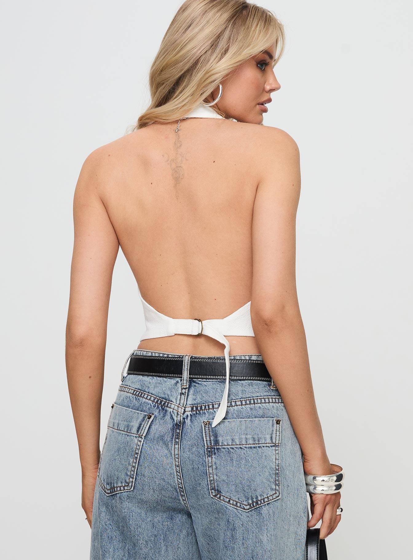 back view of model wearing Princess Polly Je Suis Halter White Sleeveless V-Neck 