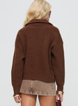 Knit sweater High neck, twin chest pockets, ribbed cuff & hem, zip fastening at front Good stretch, unlined 