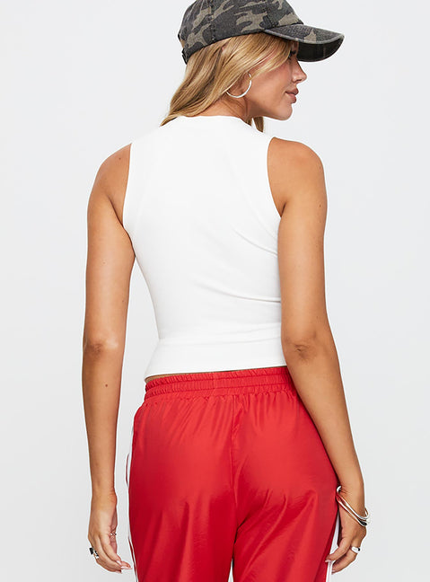 back view of model wearing Princess Polly Healing Energy Funnel Neck Top White Sleeveless High Neck 
